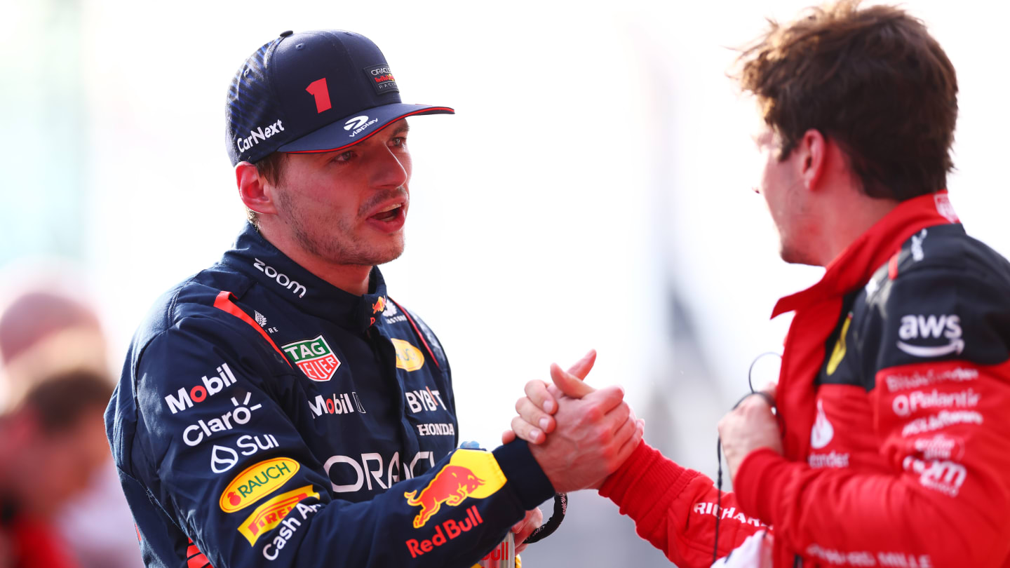 AUSTIN, TEXAS - OCTOBER 21: Sprint winner Max Verstappen of the Netherlands and Oracle Red Bull Racing shakes hands with Third placed Charles Leclerc of Monaco and Ferrari in parc ferme after the Sprint ahead of the F1 Grand Prix of United States at Circuit of The Americas on October 21, 2023 in Austin, Texas. (Photo by Dan Istitene - Formula 1/Formula 1 via Getty Images)
