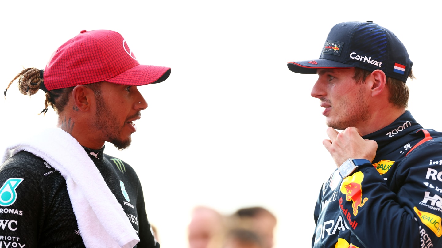 AUSTIN, TEXAS - OCTOBER 21: Sprint winner Max Verstappen of the Netherlands and Oracle Red Bull Racing and Second placed Lewis Hamilton of Great Britain and Mercedes talk in parc ferme after the Sprint ahead of the F1 Grand Prix of United States at Circuit of The Americas on October 21, 2023 in Austin, Texas. (Photo by Dan Istitene - Formula 1/Formula 1 via Getty Images)