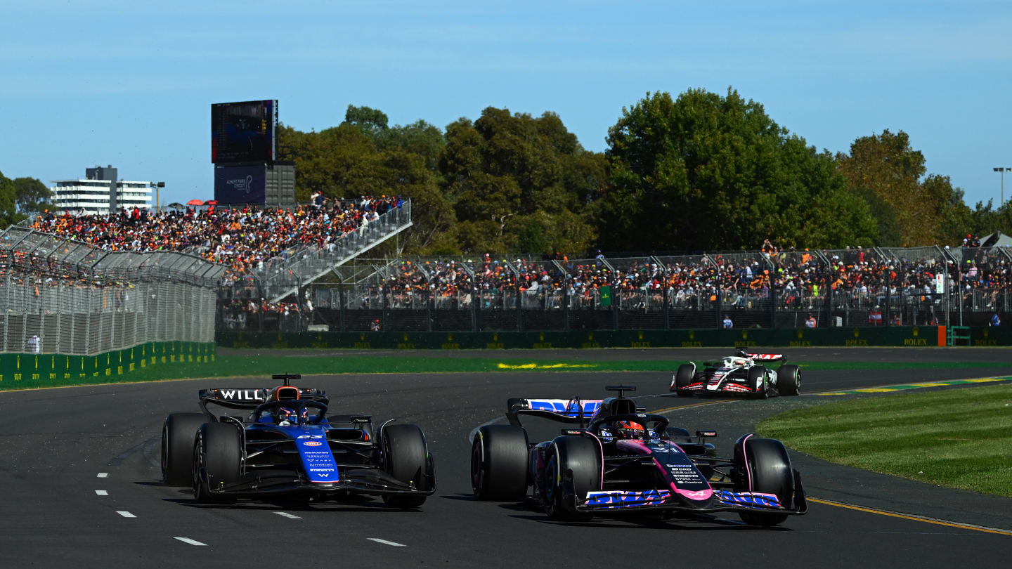 MELBOURNE, AUSTRALIA - MARCH 24: Alexander Albon of Thailand driving the (23) Williams FW46 Mercedes and Esteban Ocon of France driving the (31) Alpine F1 A524 Renault battle for track position during the F1 Grand Prix of Australia at Albert Park Circuit on March 24, 2024 in Melbourne, Australia. (Photo by Clive Mason - Formula 1/Formula 1 via Getty Images)