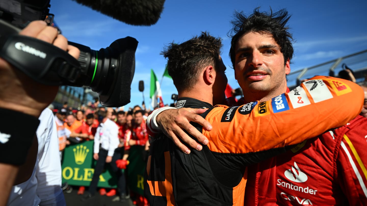 MELBOURNE, AUSTRALIA - MARCH 24: Race winner Carlos Sainz of Spain and Ferrari and Third placed Lando Norris of Great Britain and McLaren celebrate in parc ferme during the F1 Grand Prix of Australia at Albert Park Circuit on March 24, 2024 in Melbourne, Australia. (Photo by Clive Mason - Formula 1/Formula 1 via Getty Images)