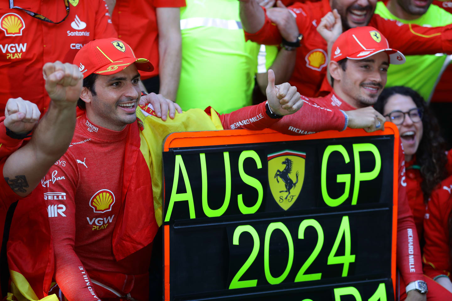 MELBOURNE, AUSTRALIA - MARCH 24: Race winner Carlos Sainz of Spain and Ferrari and Second placed