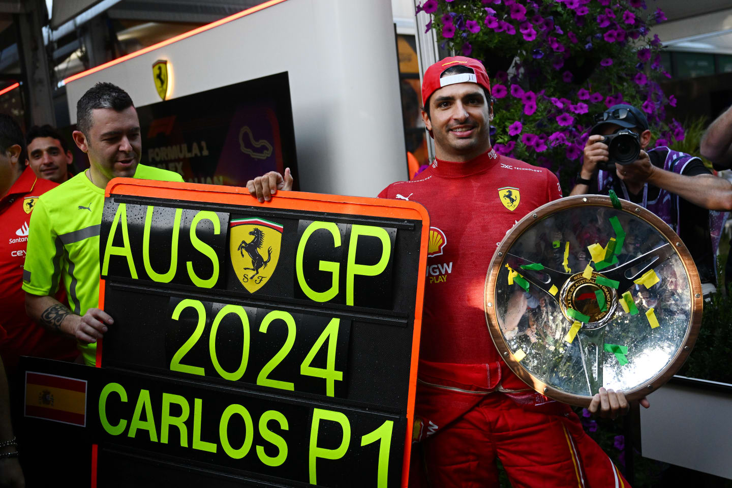 MELBOURNE, AUSTRALIA - MARCH 24: Race winner Carlos Sainz of Spain and Ferrari celebrates with his