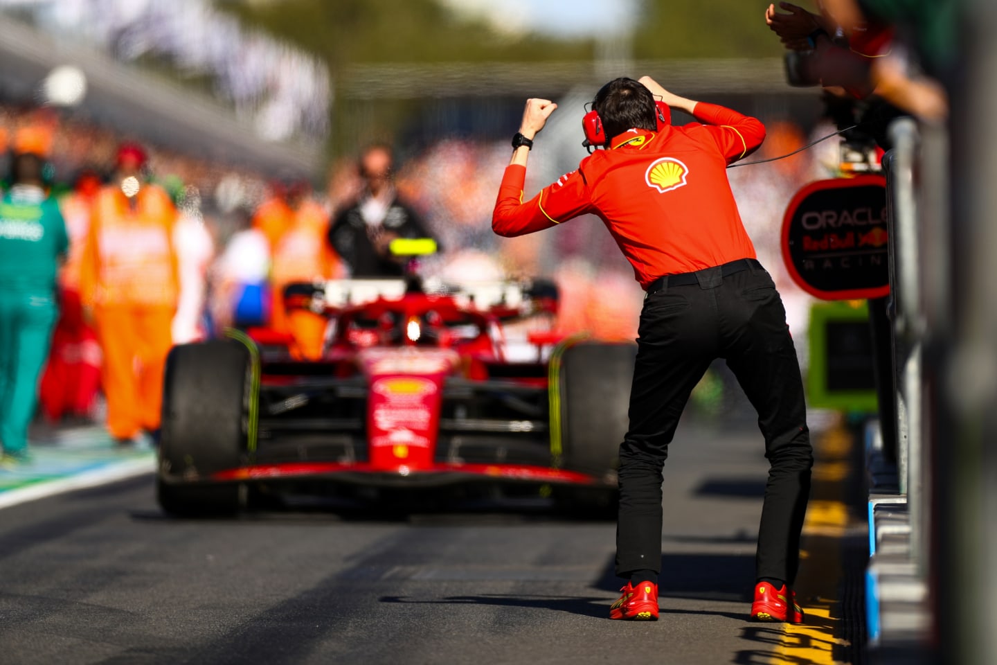 MELBOURNE, AUSTRALIA - MARCH 24: Carlos Sainz of Ferrari  is congratulated by his race engineer