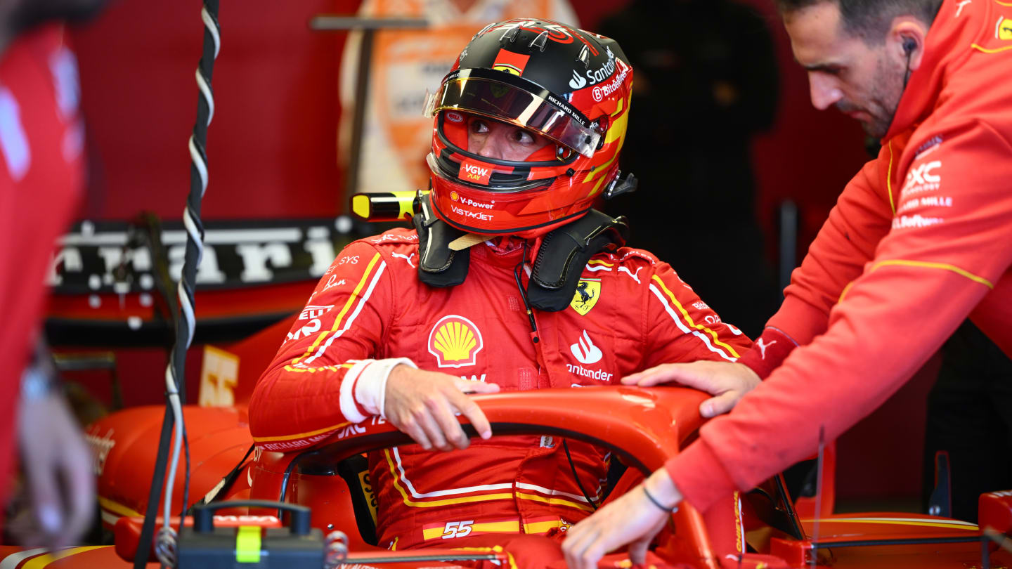 MELBOURNE, AUSTRALIA - MARCH 22: Carlos Sainz of Spain and Ferrari prepares to drive in the garage