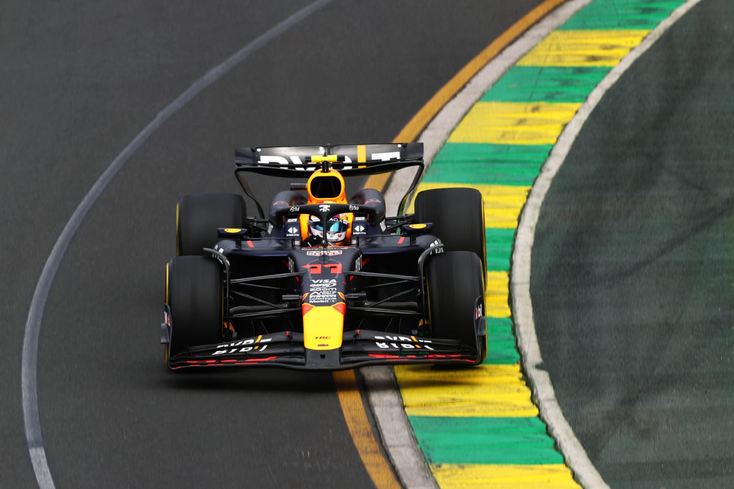 MELBOURNE, AUSTRALIA - MARCH 23: Sergio Perez of Mexico driving the (11) Oracle Red Bull Racing