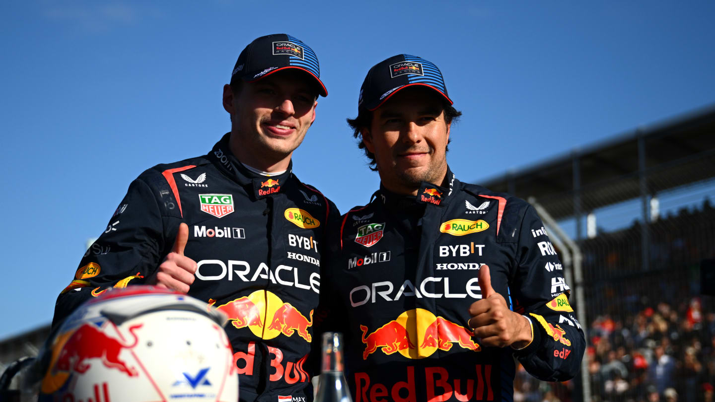 MELBOURNE, AUSTRALIA - MARCH 23: Pole position qualifier Max Verstappen of the Netherlands and Oracle Red Bull Racing and Third placed qualifier Sergio Perez of Mexico and Oracle Red Bull Racing celebrate in parc ferme during qualifying ahead of the F1 Grand Prix of Australia at Albert Park Circuit on March 23, 2024 in Melbourne, Australia. (Photo by Clive Mason - Formula 1/Formula 1 via Getty Images)