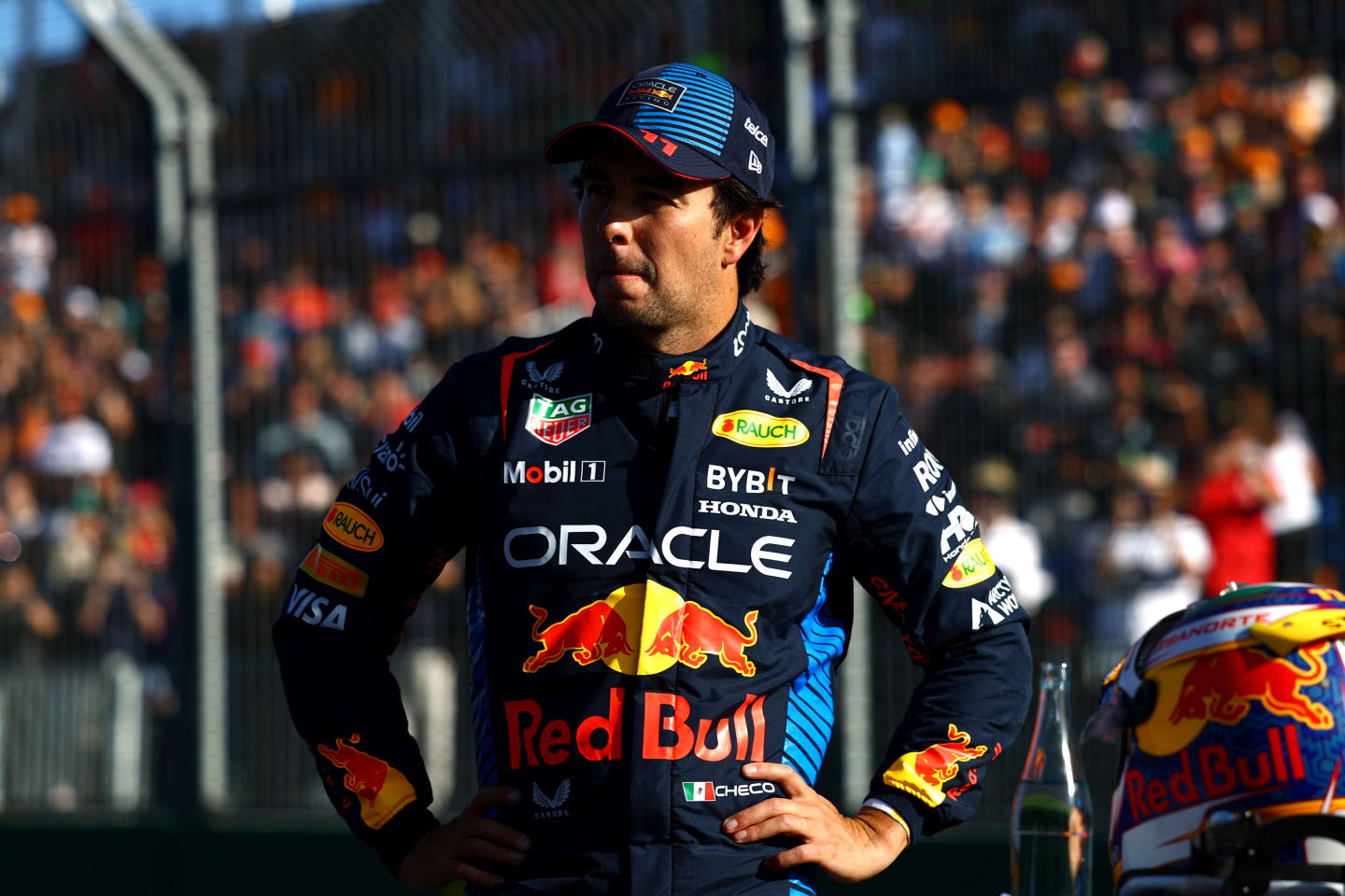MELBOURNE, AUSTRALIA - MARCH 23: Third placed qualifier Sergio Perez of Mexico and Oracle Red Bull Racing looks on in parc ferme during qualifying ahead of the F1 Grand Prix of Australia at Albert Park Circuit on March 23, 2024 in Melbourne, Australia. (Photo by Mark Thompson/Getty Images)