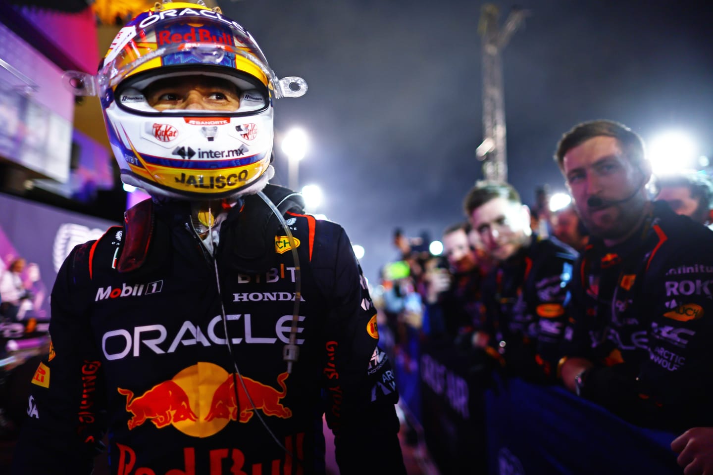 BAHRAIN, BAHRAIN - MARCH 02: Second placed Sergio Perez of Mexico and Oracle Red Bull Racing walks in parc ferme during the F1 Grand Prix of Bahrain at Bahrain International Circuit on March 02, 2024 in Bahrain, Bahrain. (Photo by Mark Thompson/Getty Images)