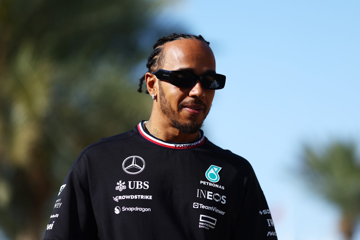 BAHRAIN, BAHRAIN - FEBRUARY 28: Lewis Hamilton of Great Britain and Mercedes walks in the Paddock
