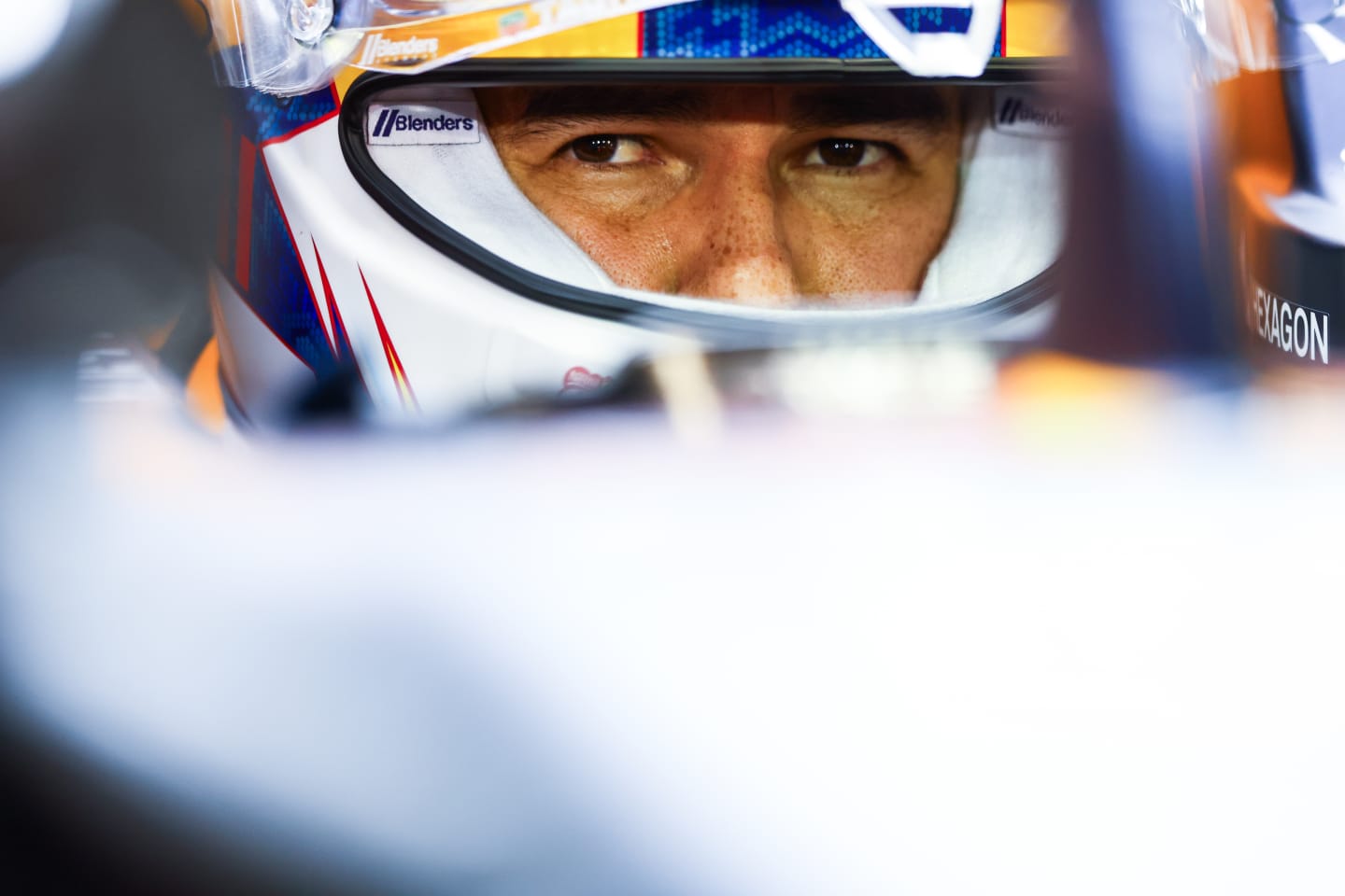 BAHRAIN, BAHRAIN - MARCH 01: Sergio Perez of Mexico and Oracle Red Bull Racing prepares to drive in the garage during qualifying ahead of the F1 Grand Prix of Bahrain at Bahrain International Circuit on March 01, 2024 in Bahrain, Bahrain. (Photo by Mark Thompson/Getty Images)