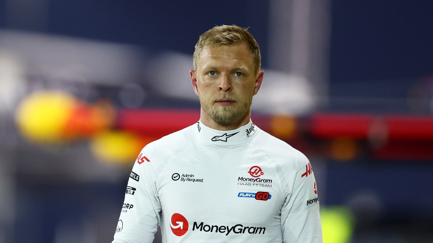 BAHRAIN, BAHRAIN - MARCH 01: 15th placed qualifier Kevin Magnussen of Denmark and Haas F1 walks in the Pitlane during qualifying ahead of the F1 Grand Prix of Bahrain at Bahrain International Circuit on March 01, 2024 in Bahrain, Bahrain. (Photo by Bryn Lennon - Formula 1/Formula 1 via Getty Images)