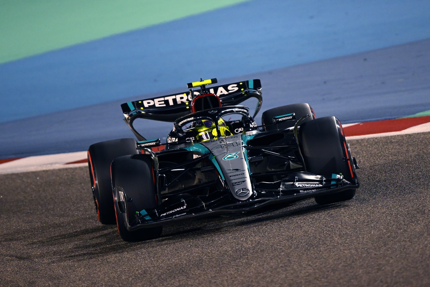 BAHRAIN, BAHRAIN - MARCH 01: Lewis Hamilton of Great Britain driving the (44) Mercedes AMG Petronas F1 Team W15 on track during qualifying ahead of the F1 Grand Prix of Bahrain at Bahrain International Circuit on March 01, 2024 in Bahrain, Bahrain. (Photo by Clive Mason/Getty Images)