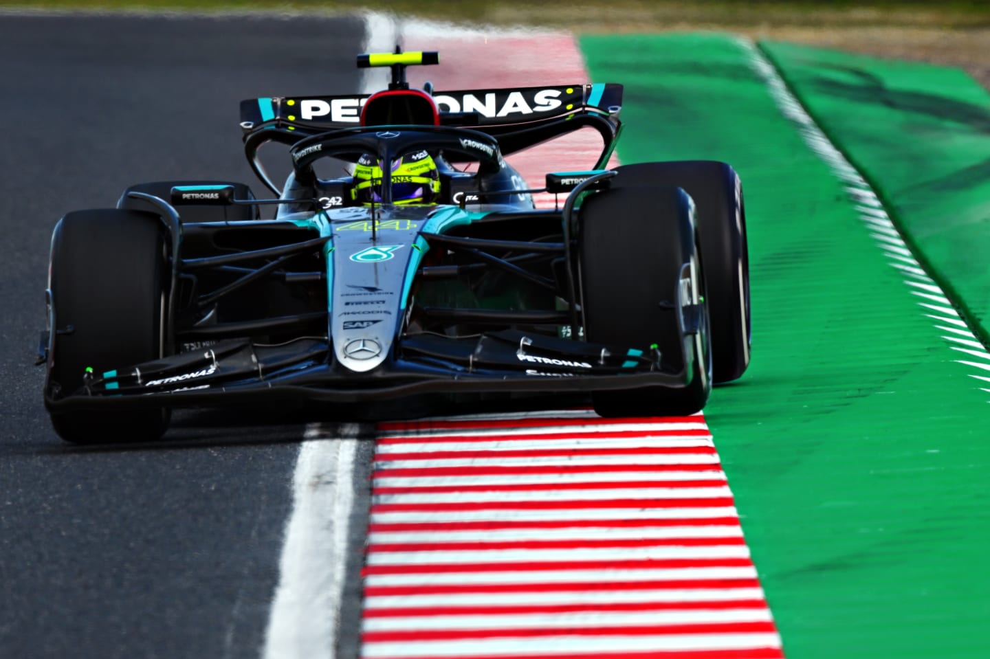 SUZUKA, JAPAN - APRIL 07: Lewis Hamilton of Great Britain driving the (44) Mercedes AMG Petronas F1