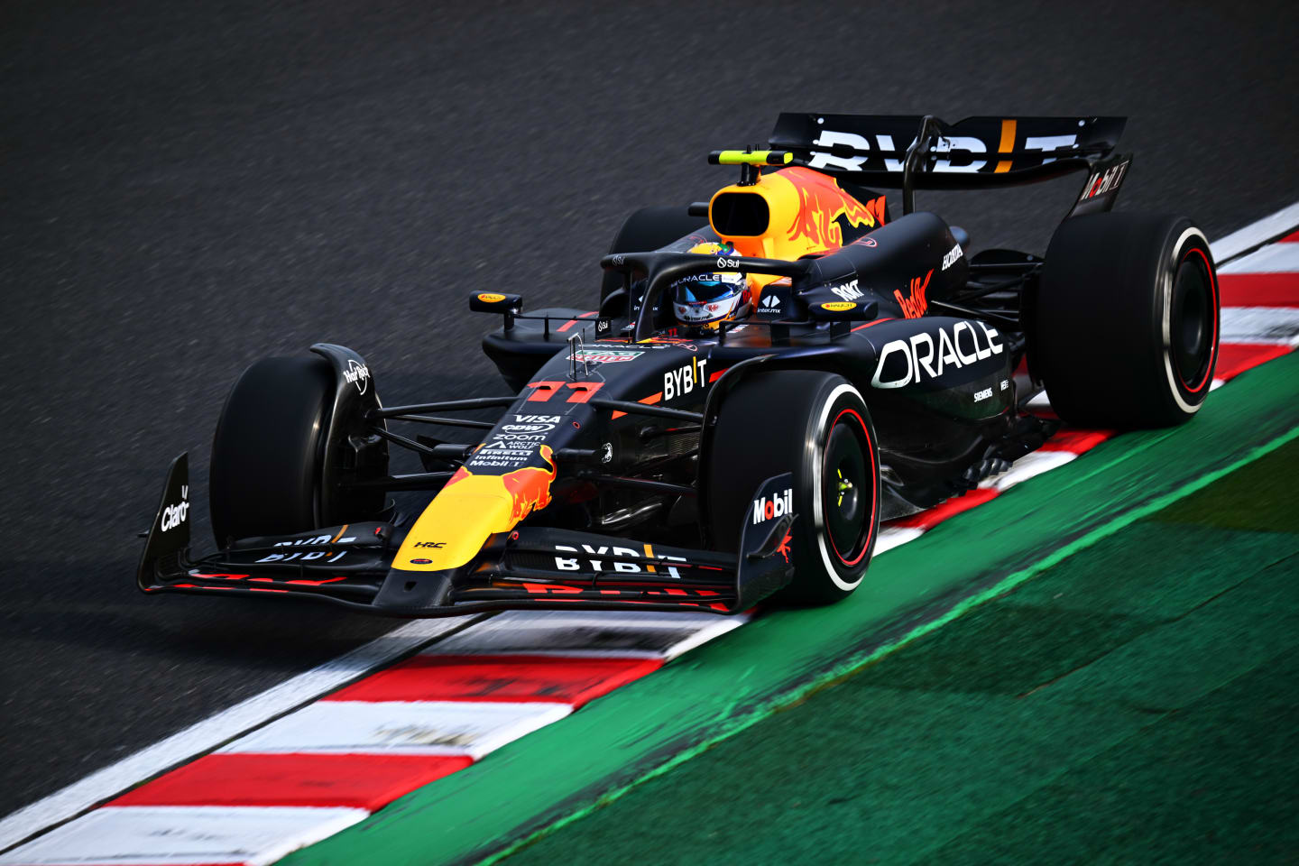 SUZUKA, JAPAN - APRIL 07: Sergio Perez of Mexico driving the (11) Oracle Red Bull Racing RB20 on