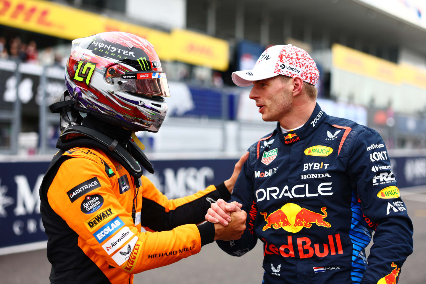 SUZUKA, JAPAN - APRIL 06: Pole position qualifier Max Verstappen of the Netherlands and Oracle Red Bull Racing and Third placed qualifier Lando Norris of Great Britain and McLaren talk in parc ferme during qualifying ahead of the F1 Grand Prix of Japan at Suzuka International Racing Course on April 06, 2024 in Suzuka, Japan. (Photo by Mark Thompson/Getty Images)