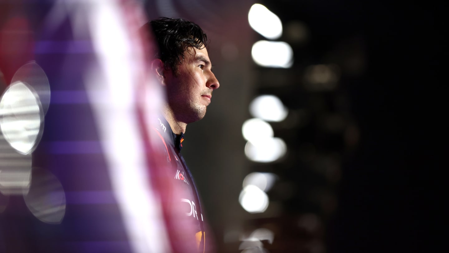 JEDDAH, SAUDI ARABIA - MARCH 09: Second placed Sergio Perez of Mexico and Oracle Red Bull Racing celebrates on the podium during the F1 Grand Prix of Saudi Arabia at Jeddah Corniche Circuit on March 09, 2024 in Jeddah, Saudi Arabia. (Photo by Bryn Lennon - Formula 1/Formula 1 via Getty Images)