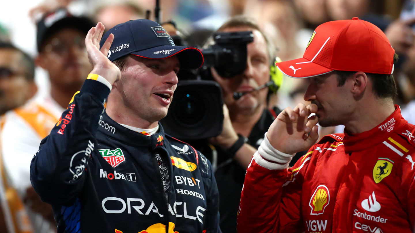 JEDDAH, SAUDI ARABIA - MARCH 09: Race winner Max Verstappen of the Netherlands and Oracle Red Bull Racing speaks to Third placed Charles Leclerc of Monaco and Ferrari in parc ferme during the F1 Grand Prix of Saudi Arabia at Jeddah Corniche Circuit on March 09, 2024 in Jeddah, Saudi Arabia. (Photo by Peter Fox - Formula 1/Formula 1 via Getty Images)