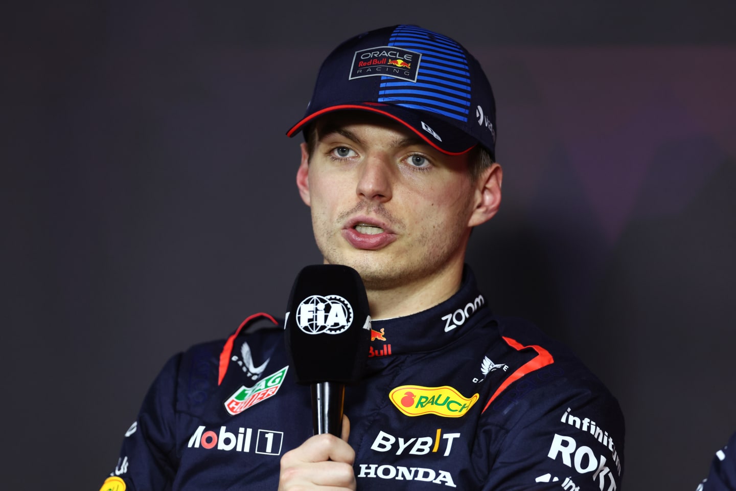 JEDDAH, SAUDI ARABIA - MARCH 08: Pole position qualifier, Max Verstappen of the Netherlands and Oracle Red Bull Racing talks in a press conference after qualifying ahead of the F1 Grand Prix of Saudi Arabia at Jeddah Corniche Circuit on March 08, 2024 in Jeddah, Saudi Arabia. (Photo by Bryn Lennon/Getty Images)