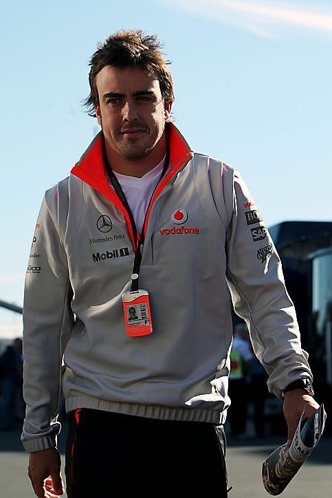 Fernando Alonso (ESP) McLaren with the Red Bulletin. Formula One World Championship, Rd 10, European Grand Prix, Qualifying Day, Nurburgring, Germany, Saturday, 21 July 2007. © Sutton Images