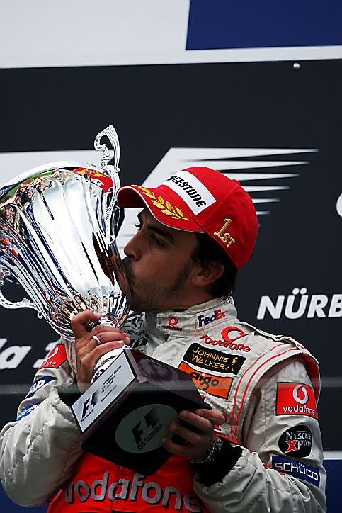 Race winner Fernando Alonso (ESP) McLaren celebrates on the podium. Formula One World Championship, Rd 10, European Grand Prix, Race, Nurburgring, Germany, Sunday, 22 July 2007 © Sutton Images. No reproduction without permission