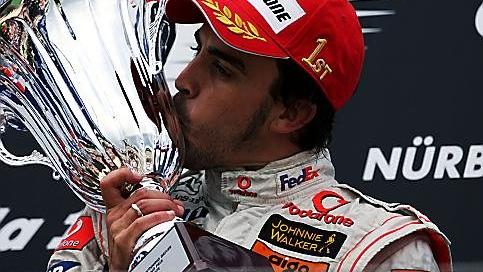 Race winner Fernando Alonso (ESP) McLaren celebrates on the podium. Formula One World Championship, Rd 10, European Grand Prix, Race, Nurburgring, Germany, Sunday, 22 July 2007 © Sutton Images. No reproduction without permission