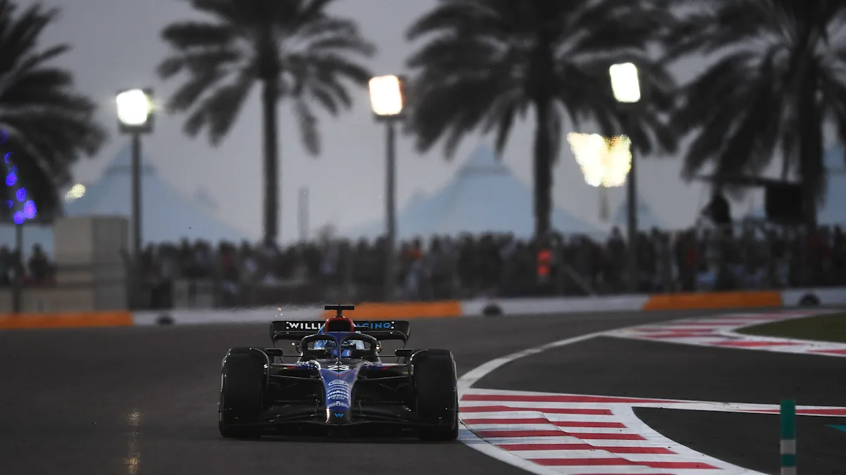 Alex Albon drives the Williams FW44 under the lights at Yas Marina Circuit during the 2022 Abu Dhabi Grand Prix.