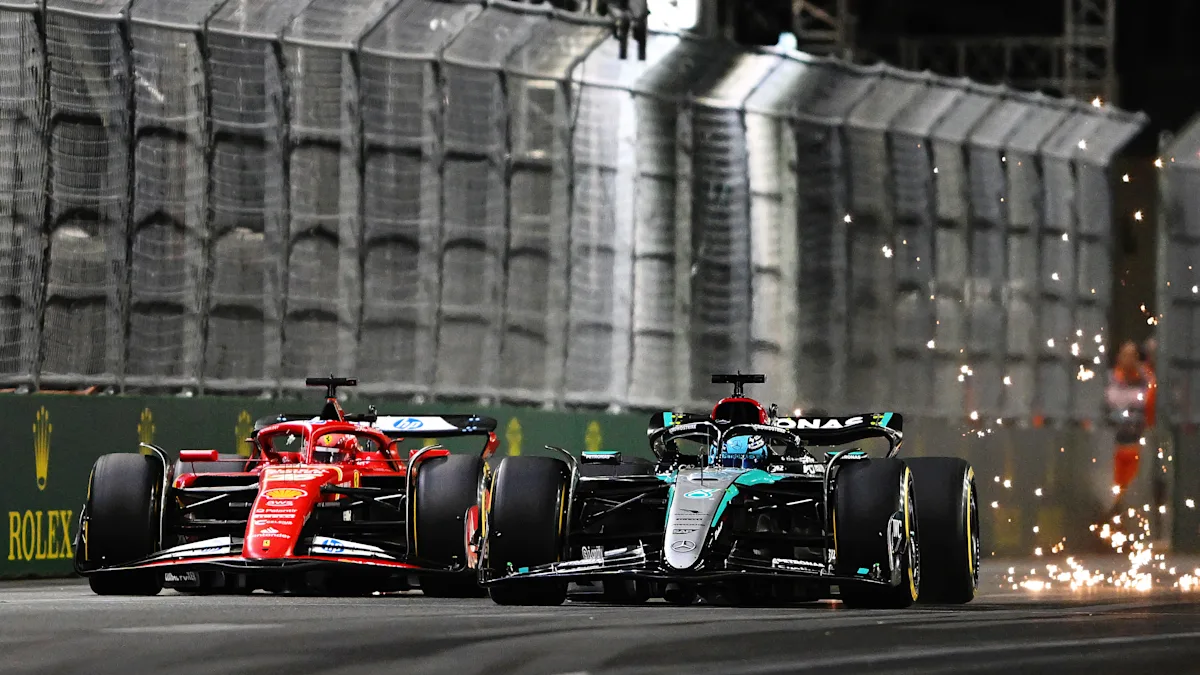 Ferrari and Mercedes Formula 1 cars on track at Las Vegas Strip Circuit