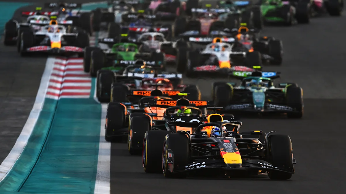 The Formula 1 field races through Yas Marina Circuit during the 2025 Abu Dhabi Grand Prix.