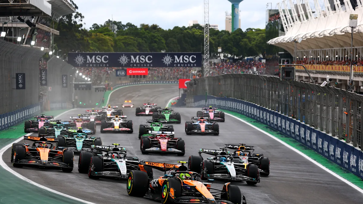 McLaren and Mercedes and Ferrari Formula 1 cars on track at Interlagos Circuit