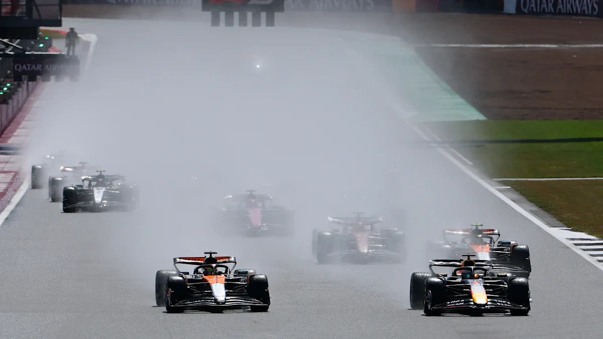 Red Bull and McLaren Formula 1 cars on track at Silverstone Circuit