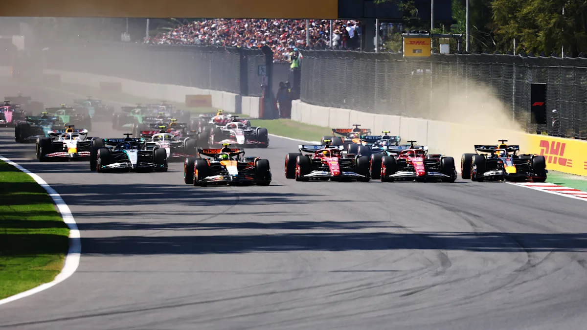 McLaren and Ferrari and Mercedes and Red Bull Formula 1 cars on track at Autódromo Hermanos Rodríguez