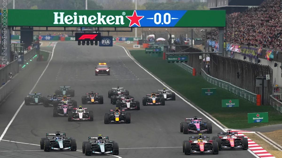 Ferrari and McLaren and Red Bull Formula 1 cars on track at Shanghai International Circuit