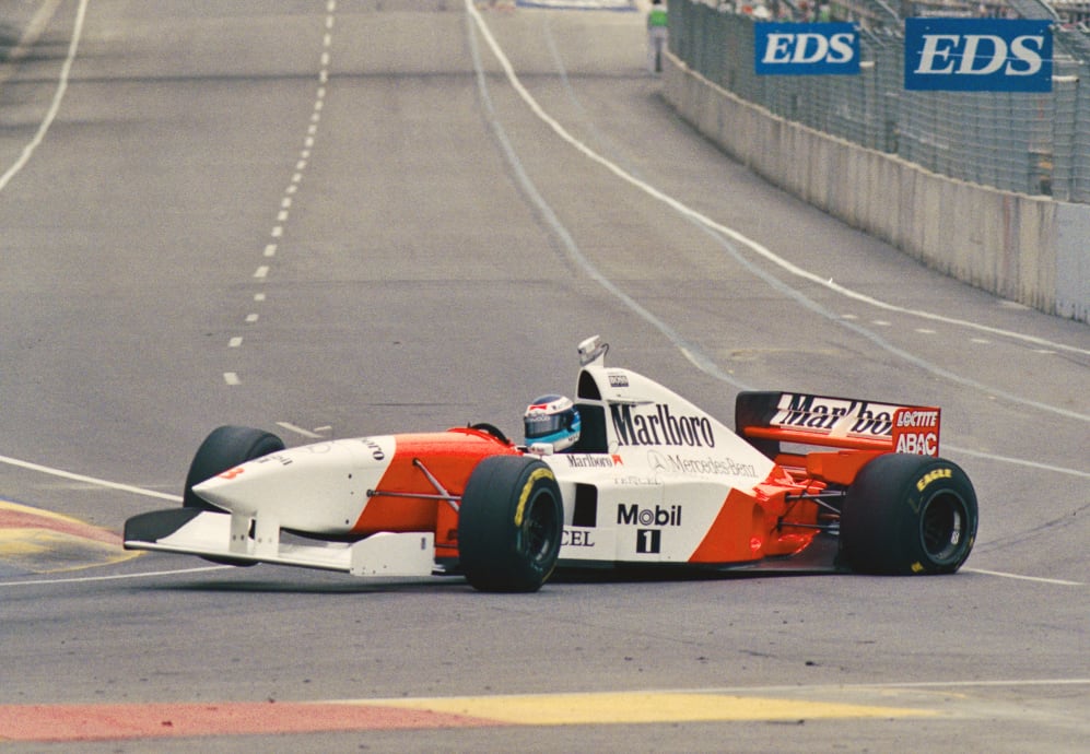 Mika Hakkinen of Finland suffers a left rear puncture leading to a serious accident as he drives