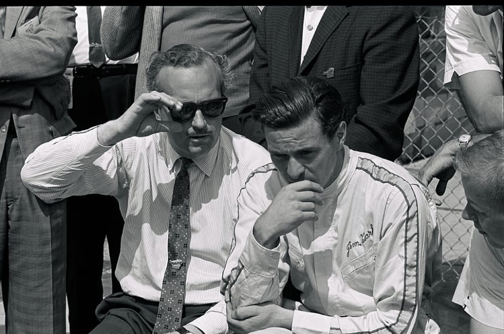 UNITED STATES - JUNE 03:  1963 Indianapolis 500. Lotus founder Colin Chapman (left) sits in pit