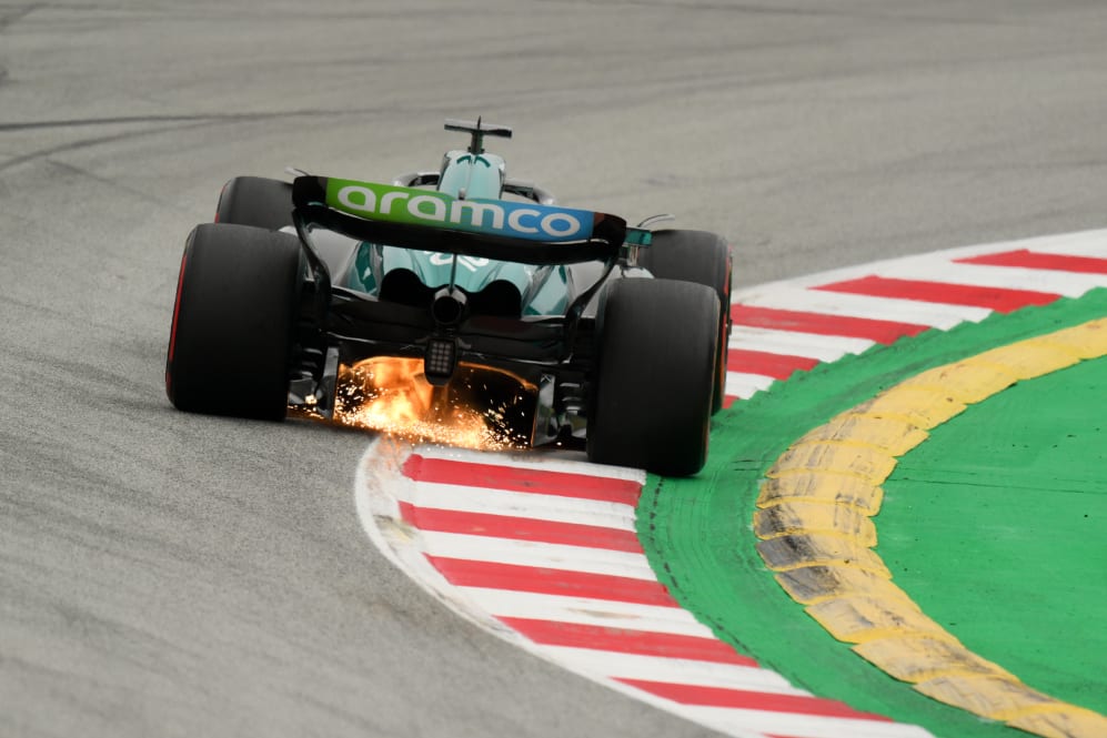 BARCELONA, SPAIN - JUNE 03: Sparks fly behind Lance Stroll of Canada driving the (18) Aston Martin