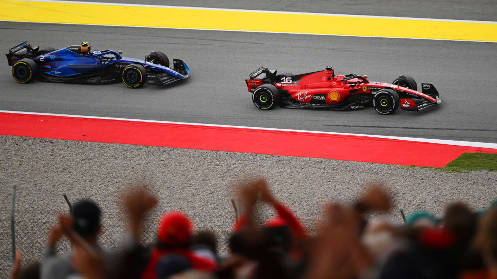 BARCELONA, SPAIN - JUNE 04: Charles Leclerc of Monaco driving the (16) Ferrari SF-23 leads Logan