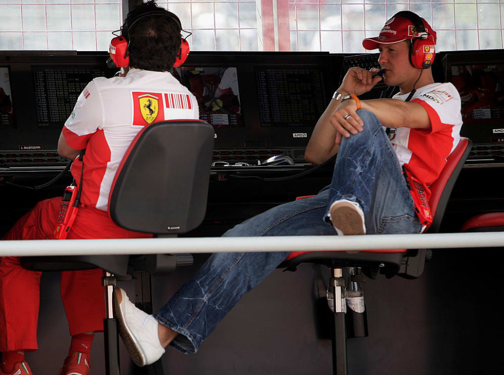 MONTREAL - JUNE 08:  Former Formula One Champion Michael Schumacher of Ferrari looks on from the