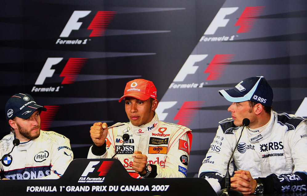 MONTREAL, QC - 10 DE JUNIO: (LR) Nick Heidfeld (2º) de Alemania y BMW Saube, Lewis Hamilton (1º)