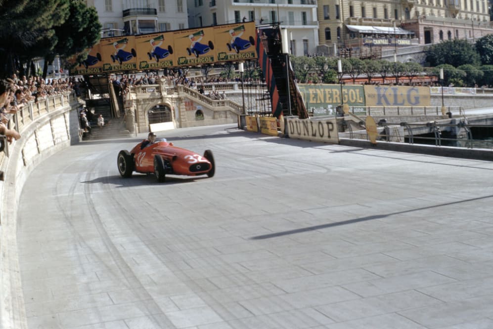 Maserati driver Juan Manuel Fangio in a full power drift at the exit of the Tabac during the Monaco