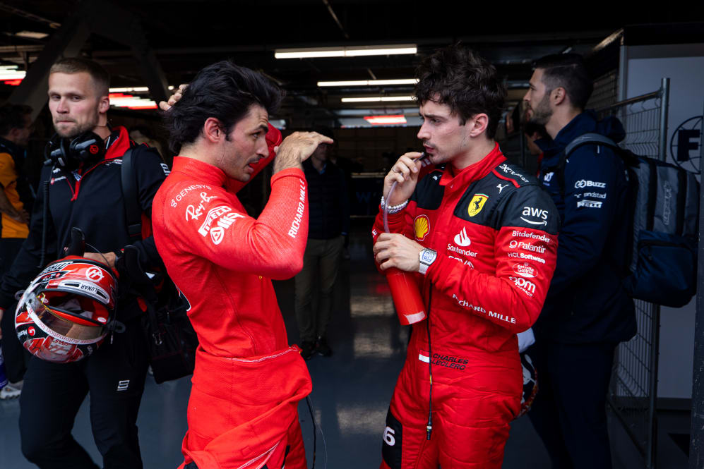 MONTREAL, QC - JUNE 18: Ferrari F1 drivers Carlos Sainz and Charles Leclerc chat post-race during
