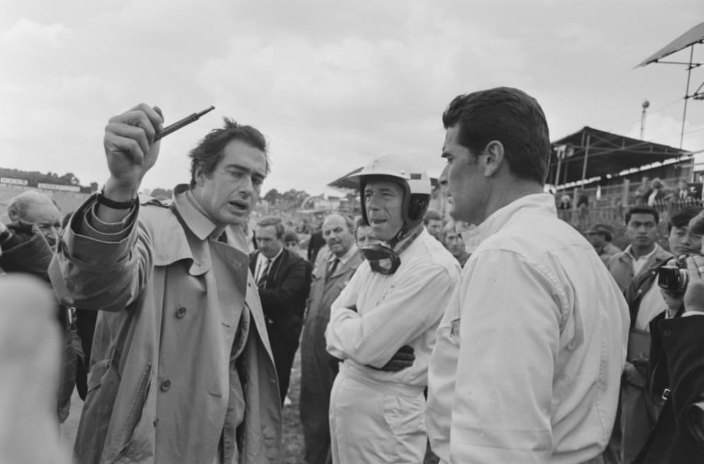 From left to right, director John Frankenheimer (1930 - 2002) and actors Yves Montand (1921 - 1991)