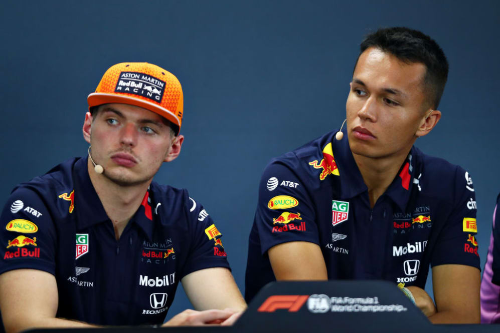 SPA, BELGIUM - AUGUST 29: Max Verstappen of Netherlands and Red Bull Racing and Alexander Albon of