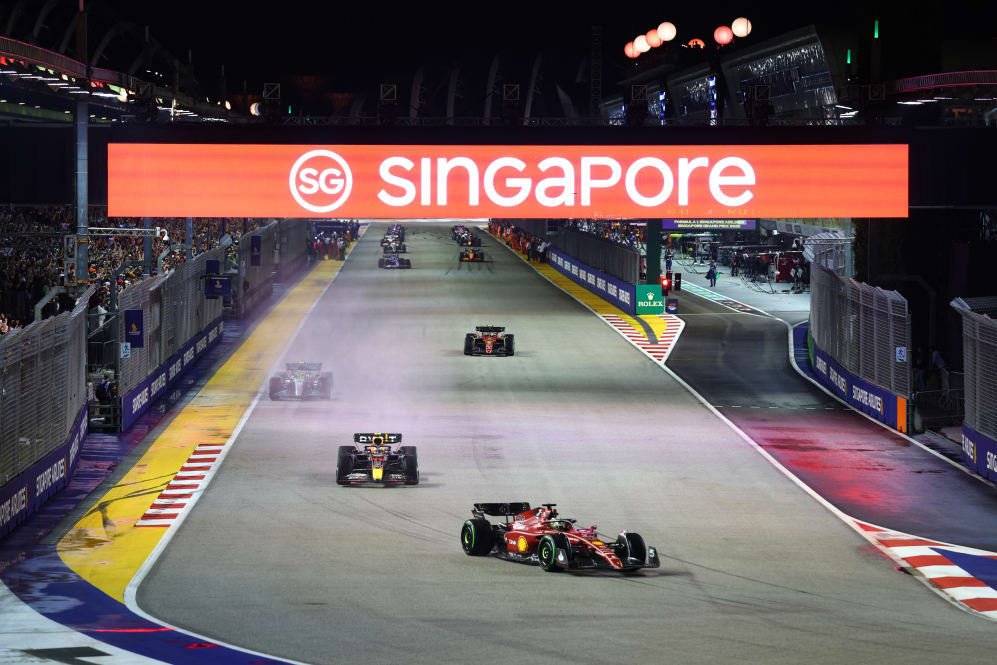 SINGAPORE, SINGAPORE - OCTOBER 02: Charles Leclerc of Monaco driving the (16) Ferrari F1-75 leads