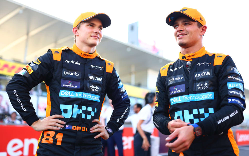 SUZUKA, JAPAN - SEPTEMBER 23:  Second placed qualifier Oscar Piastri of Australia and McLaren talks