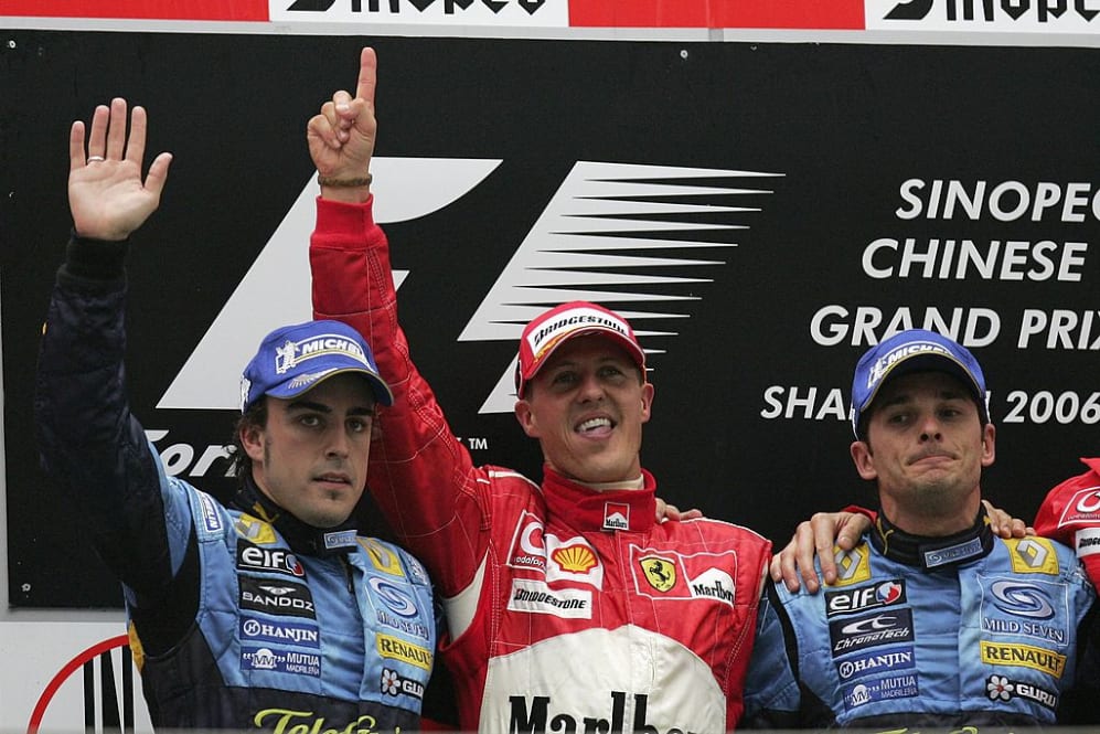 SHANGHAI, CHINA - OCTOBER 01:  Michael Schumacher of Germany and Ferrari celebrates on the podium