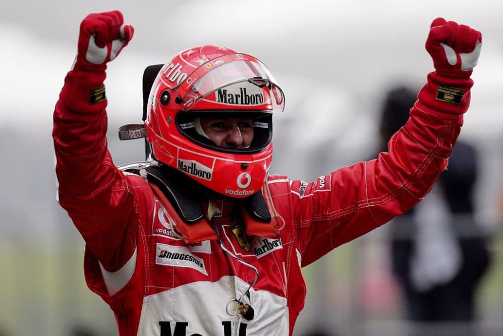 SHANGHAI, CHINA - OCTOBER 01:  Michael Schumacher of Germany and Ferrari celebrates after winning