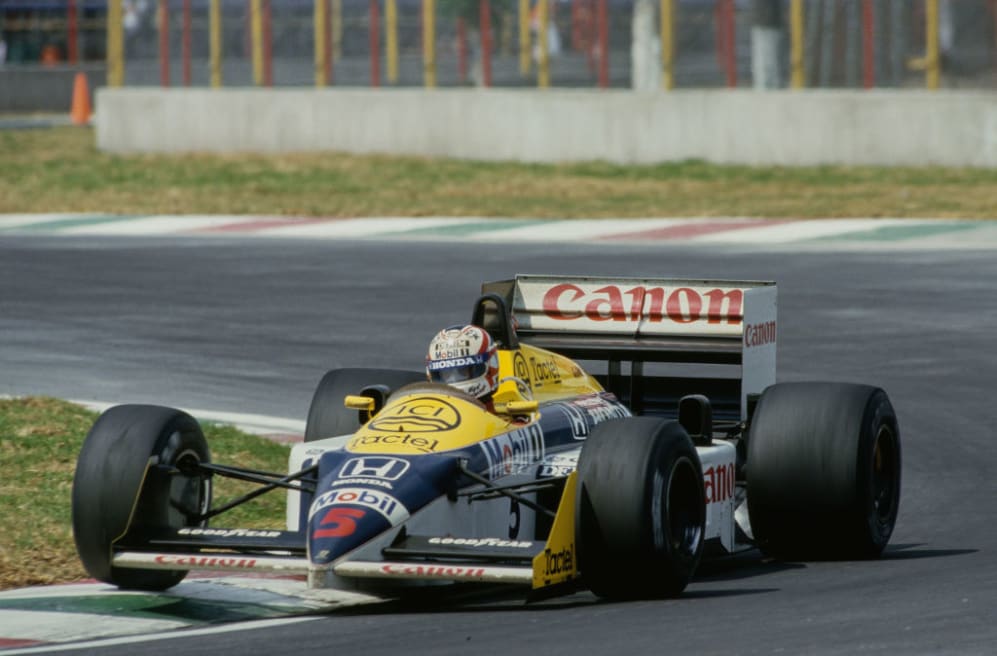 Nigel Mansell from Great Britain drives the #5 Canon Williams Honda Williams FW11 Honda V6 over the