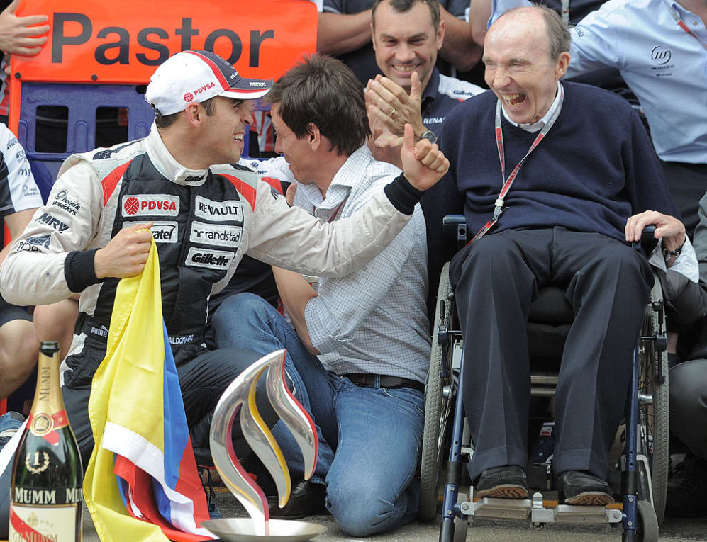 William's Venezuelan driver Pastor Maldonado and William's team principal Frank Williams celebrate