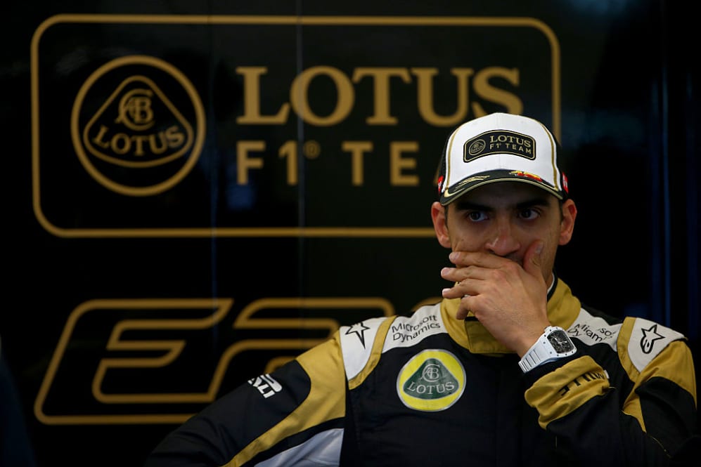 AUSTIN, TX - OCTOBER 24:  Pastor Maldonado of Venezuela and Lotus yawns as he stands in the garage