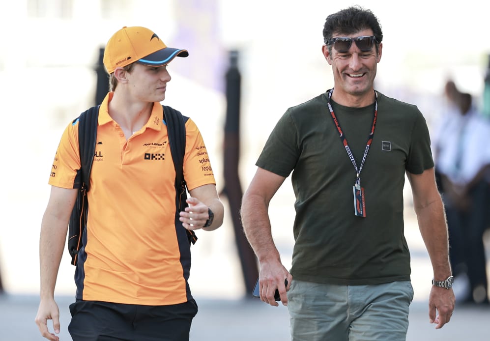 LUSAIL CITY, QATAR - OCTOBER 6: Oscar Piastri of Australia and McLaren F1 Team and Mark Webber